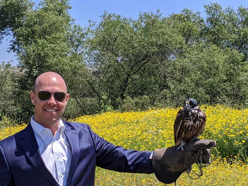 Attorney Jeffrey A. Coleman holding a falcon