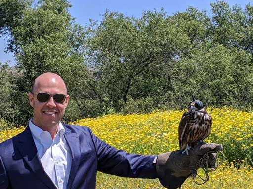 Attorney Jeffrey Coleman holding a falcon